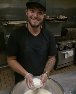 Eddie, owner, makes fresh mozzarella cheese Sweet Brew in Denver, CO